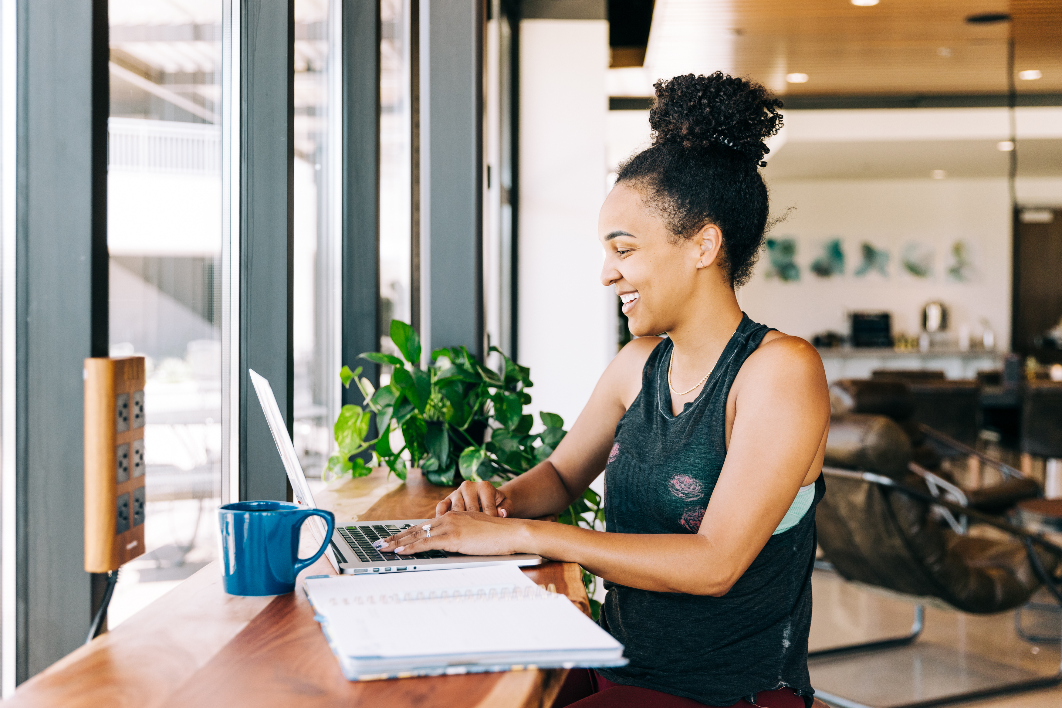 Female designer working on Showit website