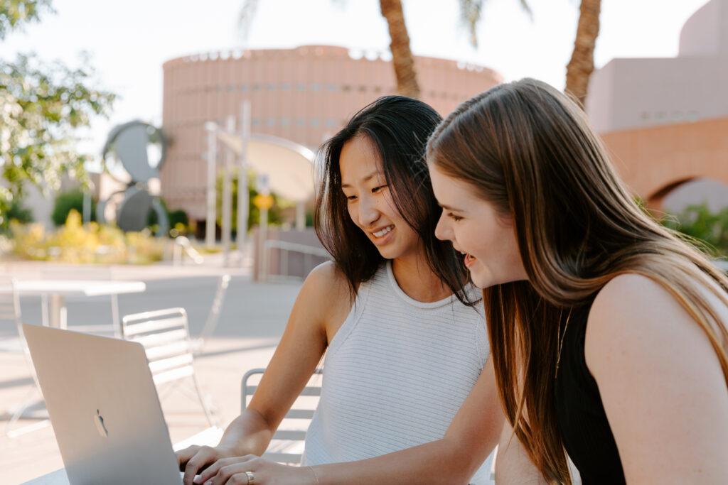 072022_SPARKbook_9015 - Showit Two female creative entrepreneurs collaborating.