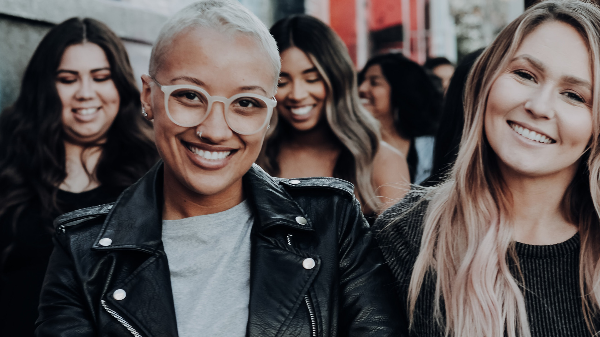 Women walking down street together